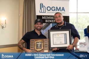 OGMA President Blake Sanders presents the 2026 OGMA/AGMCA Joint Bursary Award to Michael Bonear.